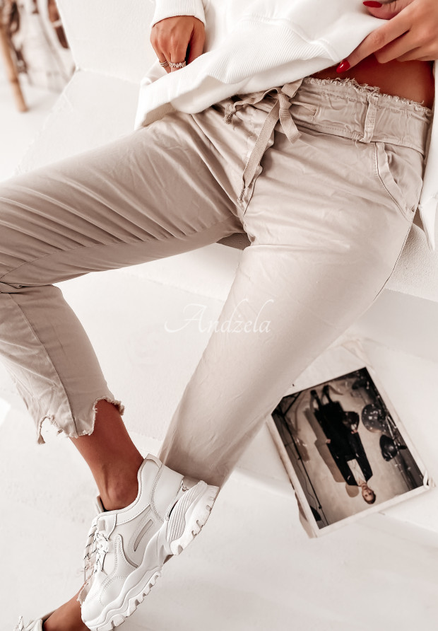 Spodnie jeansowe z przetarciami Daisy beżowe