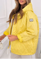 Krátka prešívaná bunda s kapucňou Springtime Starts žltá