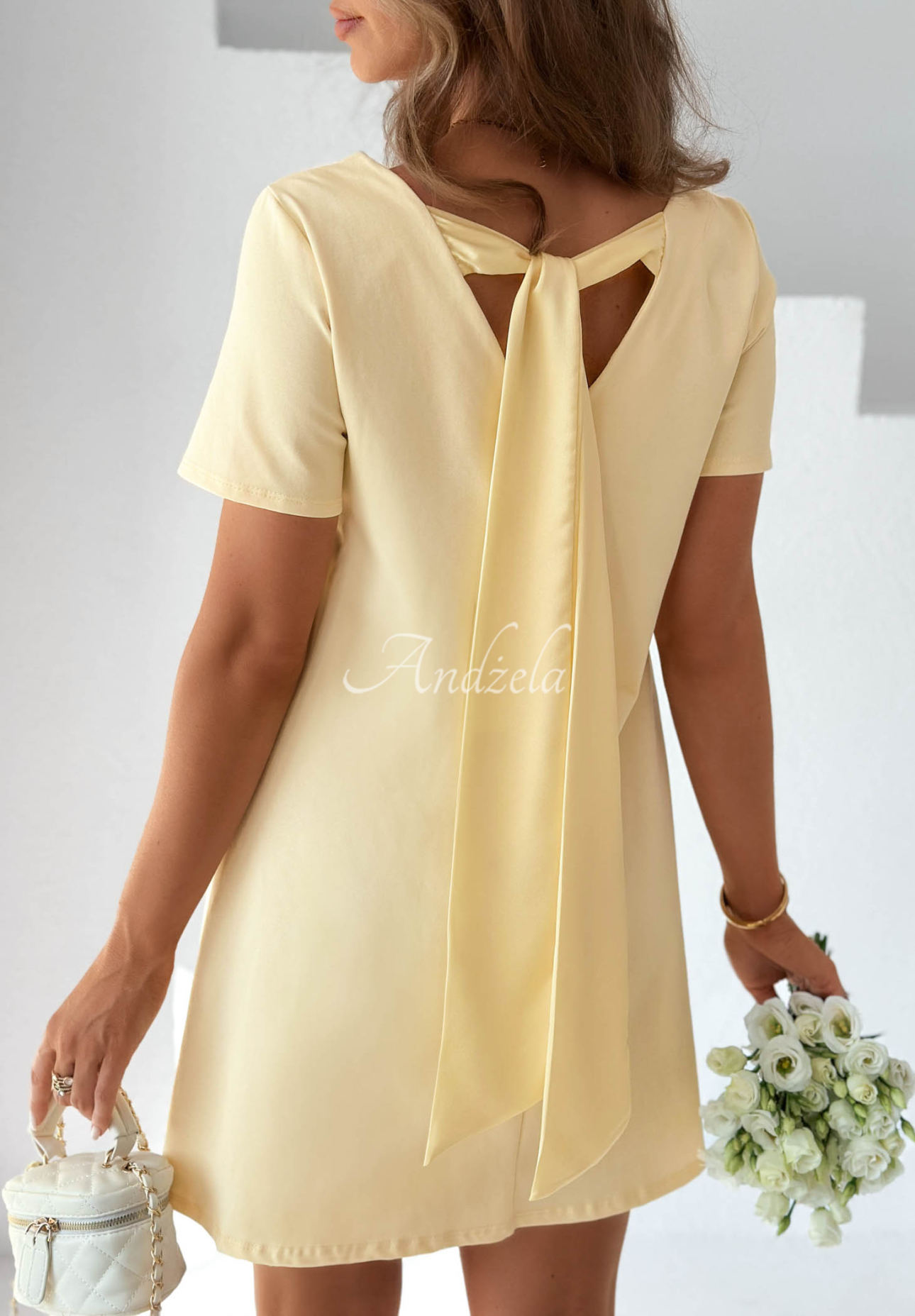 Bavlnené šaty mini s mašľou Mariette žltá