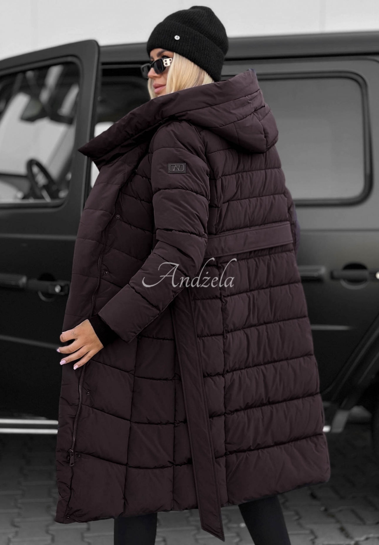 Dlhá prešívaná bunda s kapucňou a opaskom Snow Empress čučoriedková